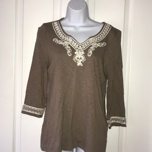 Chico’s brown and white top.